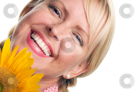 To use this stock image in your creative project, please select the size you need over to the right and click the "Add to Cart" button.
Your downloaded image will come with the Cutcaster watermark removed so don’t worry about the watermark you see on this page. Attractive Blond and Sunflower stock photo, Attractive Blond and Sunflower isolated on a White Background. by Andy Dean
