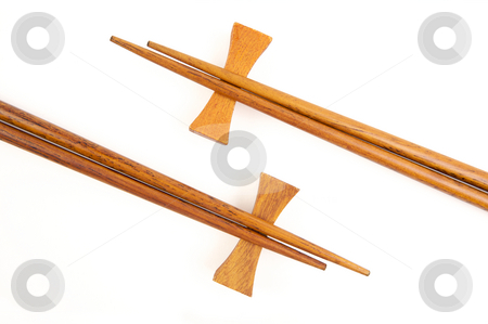 To use this stock image in your creative project, please select the size you need over to the right and click the "Add to Cart" button.
Your downloaded image will come with the Cutcaster watermark removed so don’t worry about the watermark you see on this page. Chopsticks on White stock photo, Two Pairs of Chopsticks Isolated on a White. by Andy Dean