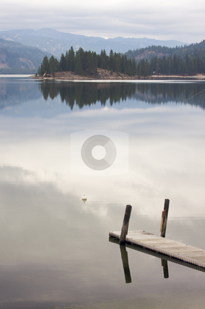 To use this stock image in your creative project, please select the size you need over to the right and click the "Add to Cart" button.
Your downloaded image will come with the Cutcaster watermark removed so don’t worry about the watermark you see on this page. Tranquil Morning Lake Scene stock photo, Tranquil Morning Lake Scene with Beautiful Reflection by Andy Dean