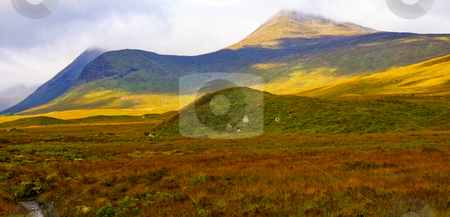 To use this stock image in your creative project, please select the size you need over to the right and click the "Add to Cart" button.
Your downloaded image will come with the Cutcaster watermark removed so don’t worry about the watermark you see on this page. Autumn hills with clouds stock photo, Nice mountain landscape in autumn colors with clouds in the back by Karin Claus