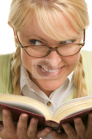 To use this stock image in your creative project, please select the size you need over to the right and click the "Add to Cart" button.
Your downloaded image will come with the Cutcaster watermark removed so don’t worry about the watermark you see on this page. Female With Ponytails Reads Her Book stock photo, Female With Ponytails Reads Her Book isolated on a White Background. by Andy Dean