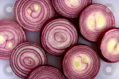 To use this stock image in your creative project, please select the size you need over to the right and click the "Add to Cart" button.
Your downloaded image will come with the Cutcaster watermark removed so don’t worry about the watermark you see on this page. Rings stock photo, Onion rings sliced and laid out on a chopping board by Paul Phillips