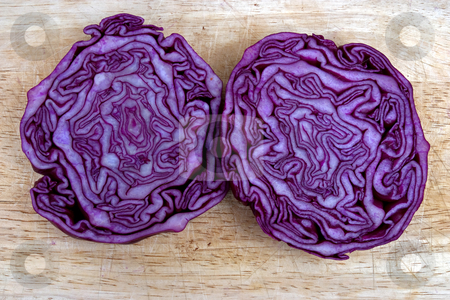 To use this stock image in your creative project, please select the size you need over to the right and click the "Add to Cart" button.
Your downloaded image will come with the Cutcaster watermark removed so don’t worry about the watermark you see on this page. Brains stock photo, Red cabbage cut in half looking like a brain by Paul Phillips