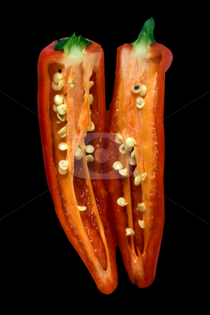 To use this stock image in your creative project, please select the size you need over to the right and click the "Add to Cart" button.
Your downloaded image will come with the Cutcaster watermark removed so don’t worry about the watermark you see on this page. Red hot stock photo, Chilli sliced and isolated on black by Paul Phillips