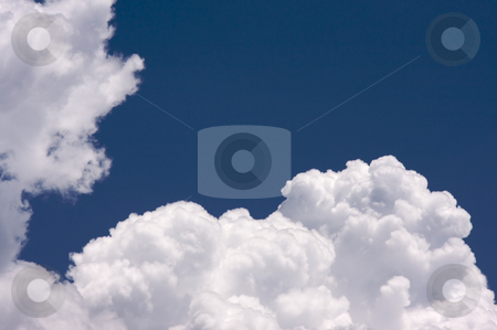 To use this stock image in your creative project, please select the size you need over to the right and click the "Add to Cart" button.
Your downloaded image will come with the Cutcaster watermark removed so don’t worry about the watermark you see on this page. Puffy Clouds stock photo, Puffy Clouds on a blue sky. by Andy Dean