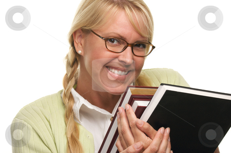 To use this stock image in your creative project, please select the size you need over to the right and click the "Add to Cart" button.
Your downloaded image will come with the Cutcaster watermark removed so don’t worry about the watermark you see on this page. Attractive Student Carrying Her Books stock photo, Attractive Student Carrying Her Books Isolated on a White Background. by Andy Dean