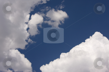 To use this stock image in your creative project, please select the size you need over to the right and click the "Add to Cart" button.
Your downloaded image will come with the Cutcaster watermark removed so don’t worry about the watermark you see on this page. Puffy Clouds on a blue sky. stock photo, Puffy Storm Clouds Forming on a blue sky. by Andy Dean