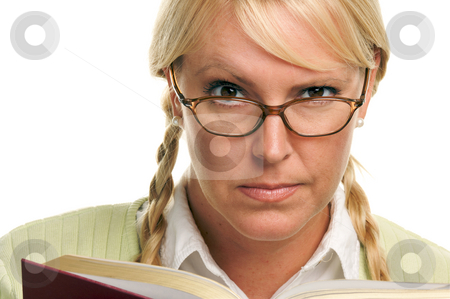To use this stock image in your creative project, please select the size you need over to the right and click the "Add to Cart" button.
Your downloaded image will come with the Cutcaster watermark removed so don’t worry about the watermark you see on this page. Serious Female with Ponytails and Book stock photo, Serious Female with Ponytails and Book isolated on a White Background. by Andy Dean