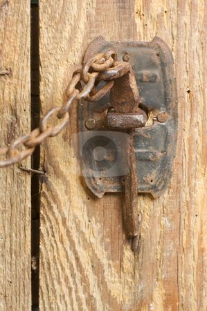 To use this stock image in your creative project, please select the size you need over to the right and click the "Add to Cart" button.
Your downloaded image will come with the Cutcaster watermark removed so don’t worry about the watermark you see on this page. Rusty Barn Door Latch and Chain stock photo, Antique Rusty Barn Door Latch and Chain by Andy Dean