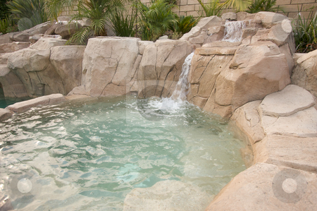 To use this stock image in your creative project, please select the size you need over to the right and click the "Add to Cart" button.
Your downloaded image will come with the Cutcaster watermark removed so don’t worry about the watermark you see on this page. Tropical Custom Pool stock photo, Tropical Custom Pool with waterfalls. by Andy Dean