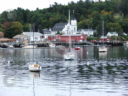 To use this stock image in your creative project, please select the size you need over to the right and click the "Add to Cart" button.
Your downloaded image will come with the Cutcaster watermark removed so don’t worry about the watermark you see on this page. Boothbay Harbor, Maine stock photo, Boothbay Harbor is a favorite Maine yachting destination in the summer months and hordes of tourists descend on this popular fishing village. Yearound it is a scenic seaport as portrayed here in this fall image. by Dennis Thomsen