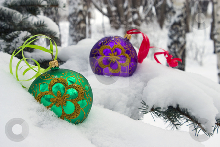 To use this stock image in your creative project, please select the size you need over to the right and click the "Add to Cart" button.
Your downloaded image will come with the Cutcaster watermark removed so don’t worry about the watermark you see on this page. Christmas time. stock photo, Two color christmas baubles sitting in a bed of snow. by Yury Ponomarev