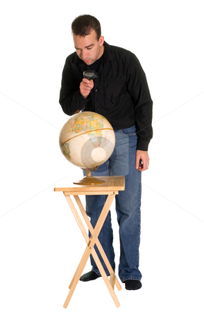 To use this stock image in your creative project, please select the size you need over to the right and click the "Add to Cart" button.
Your downloaded image will come with the Cutcaster watermark removed so don’t worry about the watermark you see on this page. Man Examining The Globe stock photo, Full body view of a man using a magnifying glass to examine a model of the earth by Richard Nelson