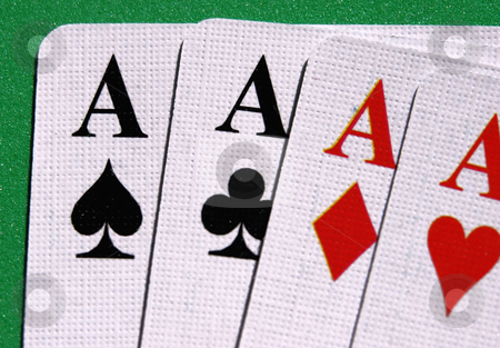 To use this stock image in your creative project, please select the size you need over to the right and click the "Add to Cart" button.
Your downloaded image will come with the Cutcaster watermark removed so don’t worry about the watermark you see on this page. Four aces stock photo, Four aces seen up close in a green table by Tim Markley