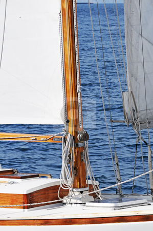 To use this stock image in your creative project, please select the size you need over to the right and click the "Add to Cart" button.
Your downloaded image will come with the Cutcaster watermark removed so don’t worry about the watermark you see on this page. Wooden boat stock photo, Wooden mast on a classic sailboat by Massimiliano Leban