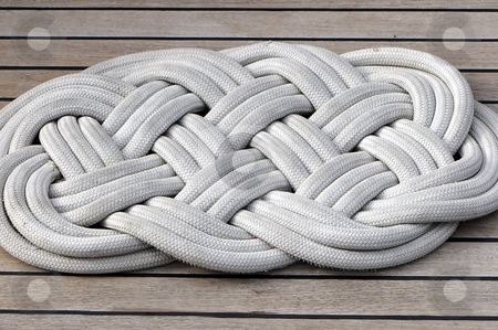 To use this stock image in your creative project, please select the size you need over to the right and click the "Add to Cart" button.
Your downloaded image will come with the Cutcaster watermark removed so don’t worry about the watermark you see on this page. Boat mat stock photo, Close-up of a rope mat on a boat by Massimiliano Leban