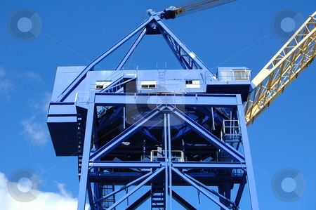 To use this stock image in your creative project, please select the size you need over to the right and click the "Add to Cart" button.
Your downloaded image will come with the Cutcaster watermark removed so don’t worry about the watermark you see on this page. Shipyard Crane stock photo, by Richard Sheehan