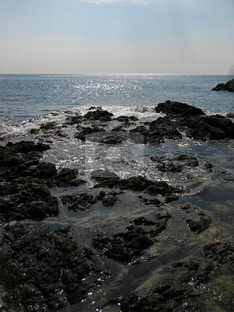 To use this stock image in your creative project, please select the size you need over to the right and click the "Add to Cart" button.
Your downloaded image will come with the Cutcaster watermark removed so don’t worry about the watermark you see on this page. Rocky shore stock photo, by Wolfgang Heidasch