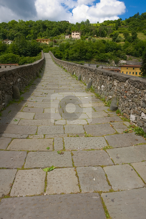 To use this stock image in your creative project, please select the size you need over to the right and click the "Add to Cart" button.
Your downloaded image will come with the Cutcaster watermark removed so don’t worry about the watermark you see on this page. An der Ponte della Maddalena, Ponte del Diavolo (Teufelsbr?cke) bei Borgo a Mozzano, Toskana, Italie stock photo, Borgo a Mozzano ist eine italienische Gemeinde in der Provinz Lucca in der Toskana. Der Ort liegt etwa 20 km n?rdlich von Lucca am Serchio. Sein Wahrzeichen ist die mittelalterliche Br?cke ?ber den Serchio, der Ponte della Maddalena, genannt Ponte del Diavolo (Teufelsbr?cke). - Borgo a Mozzano is a town and commune in the province of Lucca, in northern Tuscany (Italy). Borgo a Mozzano is dominated by the presence of Ponte della Maddalena also called