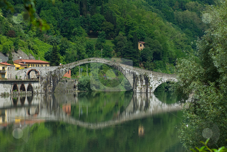 To use this stock image in your creative project, please select the size you need over to the right and click the "Add to Cart" button.
Your downloaded image will come with the Cutcaster watermark removed so don’t worry about the watermark you see on this page. An der Ponte della Maddalena, Ponte del Diavolo (Teufelsbr?cke) bei Borgo a Mozzano, Toskana, Italie stock photo, Borgo a Mozzano ist eine italienische Gemeinde in der Provinz Lucca in der Toskana. Der Ort liegt etwa 20 km n?rdlich von Lucca am Serchio. Sein Wahrzeichen ist die mittelalterliche Br?cke ?ber den Serchio, der Ponte della Maddalena, genannt Ponte del Diavolo (Teufelsbr?cke). - Borgo a Mozzano is a town and commune in the province of Lucca, in northern Tuscany (Italy). Borgo a Mozzano is dominated by the presence of Ponte della Maddalena also called