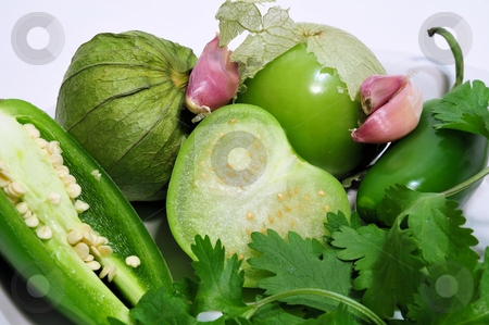 To use this stock image in your creative project, please select the size you need over to the right and click the "Add to Cart" button.
Your downloaded image will come with the Cutcaster watermark removed so don’t worry about the watermark you see on this page. Salsa Verde Ingrediants stock photo, Ingrediants for Salsa Verda. tomatillos, Jalapeno peppers, Garlic and Cilantro by Lynn Bendickson