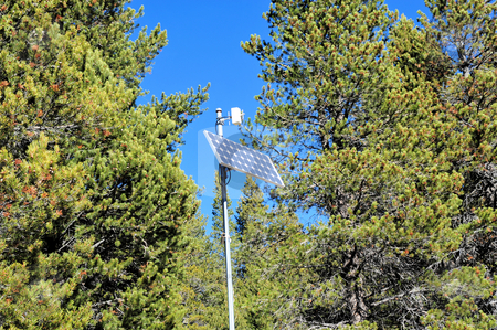 To use this stock image in your creative project, please select the size you need over to the right and click the "Add to Cart" button.
Your downloaded image will come with the Cutcaster watermark removed so don’t worry about the watermark you see on this page. Solar Power Cells stock photo, Solar power panel and transmitter located deep in te forest by Lynn Bendickson