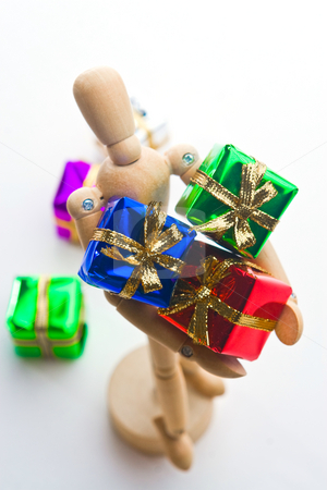 To use this stock image in your creative project, please select the size you need over to the right and click the "Add to Cart" button.
Your downloaded image will come with the Cutcaster watermark removed so don’t worry about the watermark you see on this page. Christmas Mannequin stock photo, Wooden Mannequin holding Christmas ornaments by Jose Wilson Araujo