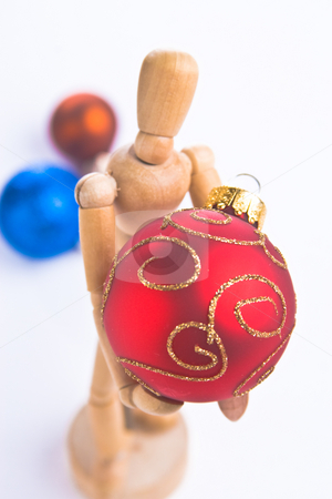 To use this stock image in your creative project, please select the size you need over to the right and click the "Add to Cart" button.
Your downloaded image will come with the Cutcaster watermark removed so don’t worry about the watermark you see on this page. Christmas Mannequin stock photo, Wooden Mannequin holding Christmas ornaments by Jose Wilson Araujo