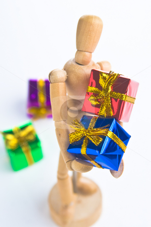 To use this stock image in your creative project, please select the size you need over to the right and click the "Add to Cart" button.
Your downloaded image will come with the Cutcaster watermark removed so don’t worry about the watermark you see on this page. Christmas Mannequin stock photo, Wooden Mannequin holding Christmas ornaments by Jose Wilson Araujo
