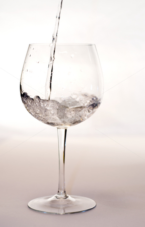 To use this stock image in your creative project, please select the size you need over to the right and click the "Add to Cart" button.
Your downloaded image will come with the Cutcaster watermark removed so don’t worry about the watermark you see on this page. Pouring Water stock photo, Watre being poured into a wine glass by Richard Nelson