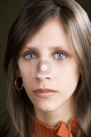 To use this stock image in your creative project, please select the size you need over to the right and click the "Add to Cart" button.
Your downloaded image will come with the Cutcaster watermark removed so don’t worry about the watermark you see on this page. Expressionless Young Woman stock photo, Pretty young woman with a blank expression on her face by Scott Griessel
