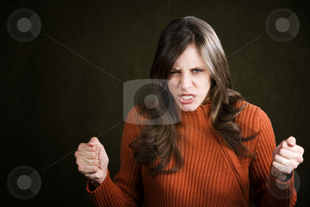 To use this stock image in your creative project, please select the size you need over to the right and click the "Add to Cart" button.
Your downloaded image will come with the Cutcaster watermark removed so don’t worry about the watermark you see on this page. Frustrated Young Woman stock photo, Frustrated Young Woman in an Orange Sweater by Scott Griessel