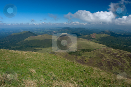 To use this stock image in your creative project, please select the size you need over to the right and click the "Add to Cart" button.
Your downloaded image will come with the Cutcaster watermark removed so don’t worry about the watermark you see on this page. Blick vom Vulkan Puy de D?me auf die umliegenden Vulkane der Cha?ne des Puys stock photo, Der Vulkan Puy de D?me (1465 m) liegt im gleichnamigen D?partement Puy-de-D?me und geh?rt zum Zentralmassiv in der s?dlichen H?lfte Frankreichs. Er geh?rt zur Kette der Puys (la Cha?ne des Puys) und ist deren h?chster Gipfel.
Er befindet sich etwa 15 km von Clermont-Ferrand entfernt, welches er um 1000 m ?berragt. Seit 1956 befindet sich auf dem Puy de D?me eine Sendeanlage f?r UKW und TV. Quelle: Wikipedia by Wolfgang Heidasch