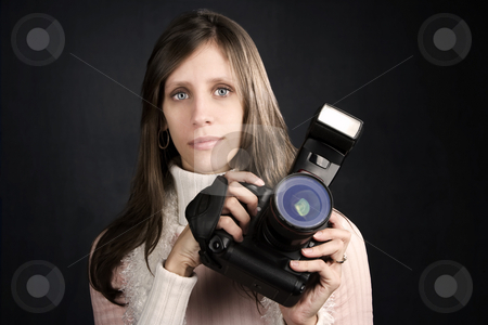 To use this stock image in your creative project, please select the size you need over to the right and click the "Add to Cart" button.
Your downloaded image will come with the Cutcaster watermark removed so don’t worry about the watermark you see on this page. Pretty Photographer stock photo, Pretty photographer with a professional camera and flash by Scott Griessel