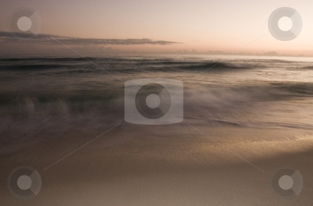 To use this stock image in your creative project, please select the size you need over to the right and click the "Add to Cart" button.
Your downloaded image will come with the Cutcaster watermark removed so don’t worry about the watermark you see on this page. Fuzzy Beach stock photo, A long exposure of the surf rolling onto the beach at sunset by A Cotton Photo