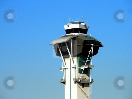 To use this stock image in your creative project, please select the size you need over to the right and click the "Add to Cart" button.
Your downloaded image will come with the Cutcaster watermark removed so don’t worry about the watermark you see on this page. Control Tower stock photo, Control Tower at an airport with blue sky in background. by Henrik Lehnerer