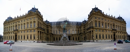 To use this stock image in your creative project, please select the size you need over to the right and click the "Add to Cart" button.
Your downloaded image will come with the Cutcaster watermark removed so don’t worry about the watermark you see on this page. Wuerzburger Residenz stock photo, Panoramic capture of the Wuerzburger Residenz with fountain in foreground. by Henrik Lehnerer