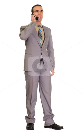To use this stock image in your creative project, please select the size you need over to the right and click the "Add to Cart" button.
Your downloaded image will come with the Cutcaster watermark removed so don’t worry about the watermark you see on this page. Businessman Talking On Cell Phone stock photo, Full body view of a young businessman talking on a cell phone, isolated against a white background by Richard Nelson