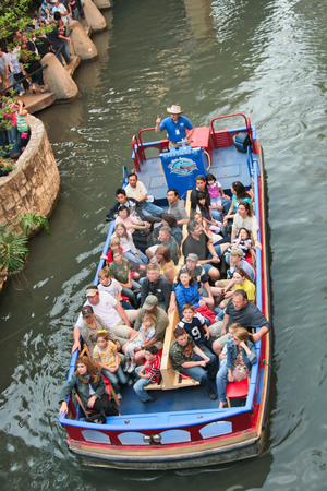 To use this stock image in your creative project, please select the size you need over to the right and click the "Add to Cart" button.
Your downloaded image will come with the Cutcaster watermark removed so don’t worry about the watermark you see on this page. Riverwalk Boat stock photo, The historic riverwalk in San Antonio Texas by Kevin Tietz