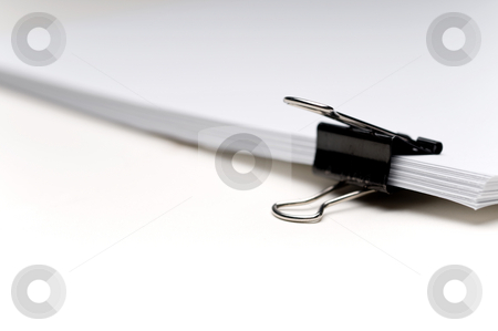 To use this stock image in your creative project, please select the size you need over to the right and click the "Add to Cart" button.
Your downloaded image will come with the Cutcaster watermark removed so don’t worry about the watermark you see on this page. Stack of paper held with a clip stock photo, Stack of paper held with a clip by Vince Clements