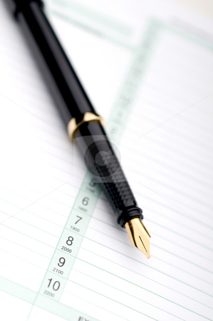 To use this stock image in your creative project, please select the size you need over to the right and click the "Add to Cart" button.
Your downloaded image will come with the Cutcaster watermark removed so don’t worry about the watermark you see on this page. Macro of a fountain pen on a day planner stock photo, Macro of a fountain pen on a business day planner by Vince Clements
