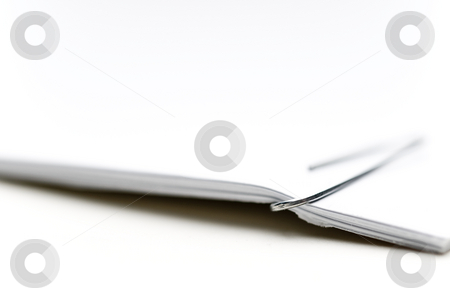 To use this stock image in your creative project, please select the size you need over to the right and click the "Add to Cart" button.
Your downloaded image will come with the Cutcaster watermark removed so don’t worry about the watermark you see on this page. Paperclip and paper stock photo, Shallow focus macro of a paperclip and paper by Vince Clements