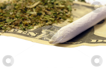 To use this stock image in your creative project, please select the size you need over to the right and click the "Add to Cart" button.
Your downloaded image will come with the Cutcaster watermark removed so don’t worry about the watermark you see on this page. Marijuana stock photo, Marijuana joint and money by John Teeter