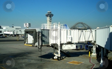 To use this stock image in your creative project, please select the size you need over to the right and click the "Add to Cart" button.
Your downloaded image will come with the Cutcaster watermark removed so don’t worry about the watermark you see on this page. Jetway Seventy-Three stock photo, Jetway at an airport with control tower in the background. by Henrik Lehnerer