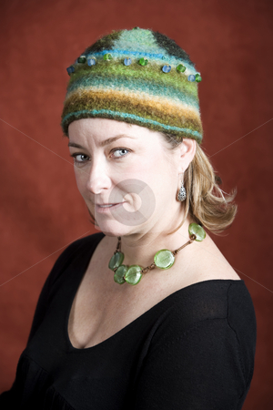 To use this stock image in your creative project, please select the size you need over to the right and click the "Add to Cart" button.
Your downloaded image will come with the Cutcaster watermark removed so don’t worry about the watermark you see on this page. Woman in a Knit Cap stock photo, Attractive Woman in a Bright Knit Cap by Scott Griessel