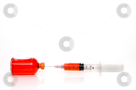 To use this stock image in your creative project, please select the size you need over to the right and click the "Add to Cart" button.
Your downloaded image will come with the Cutcaster watermark removed so don’t worry about the watermark you see on this page. Medicine Vial and Syringe stock photo, A prescription medicine vial and a syringe. by Robert Byron