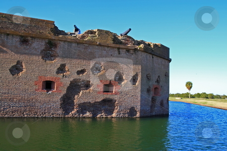 To use this stock image in your creative project, please select the size you need over to the right and click the "Add to Cart" button.
Your downloaded image will come with the Cutcaster watermark removed so don’t worry about the watermark you see on this page. Cannon Ball Damage stock photo, Fort pulaski canon ball damage during civil war by Jack Schiffer