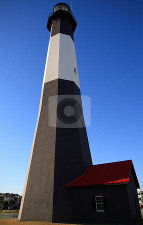 To use this stock image in your creative project, please select the size you need over to the right and click the "Add to Cart" button.
Your downloaded image will come with the Cutcaster watermark removed so don’t worry about the watermark you see on this page. Light House stock photo, Tybee Island light house historical site georgia by Jack Schiffer