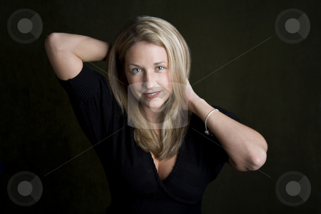 To use this stock image in your creative project, please select the size you need over to the right and click the "Add to Cart" button.
Your downloaded image will come with the Cutcaster watermark removed so don’t worry about the watermark you see on this page. Pretty woman with blue eyes stock photo, Pretty woman with blue eyes and hands behind her head by Scott Griessel