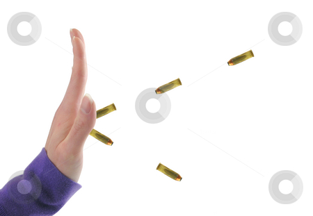 To use this stock image in your creative project, please select the size you need over to the right and click the "Add to Cart" button.
Your downloaded image will come with the Cutcaster watermark removed so don’t worry about the watermark you see on this page. Hand stopping bullets stock photo, Hand stopping bullets on a white background by John Teeter